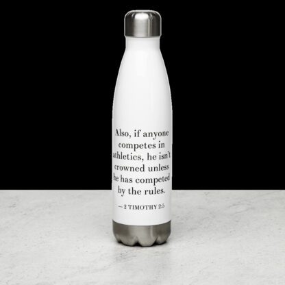 Bilingual stainless steel water bottle with English (2 Timothy 2:5) white 17 oz back view on white table